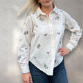 Blouse écrue à broderies fleuries